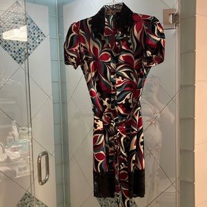 Bisou Bisou Medium Wrap button up topper.  Lace detail on collar + bottom trim.